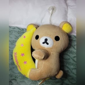Sanrio Rilakkuma plush with window sticker